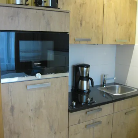 - Aparthotel